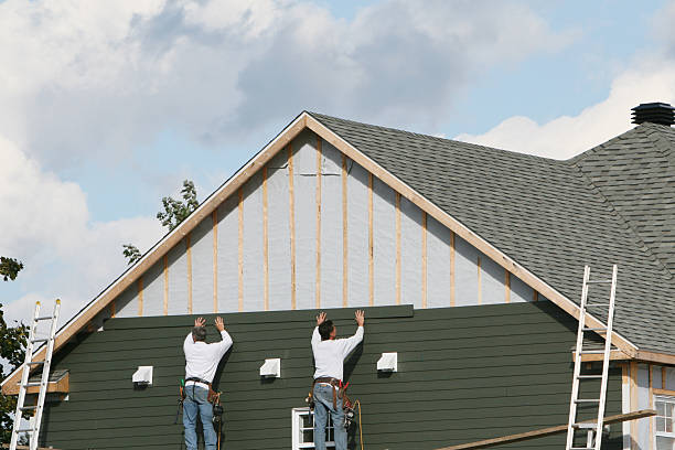 Professional Siding technician working in Lindenhurst, NY